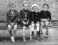 Дети возле дома. Я в панамке, слева - моя сестра, справа - друг детства Пименов (примерно 1960 год)