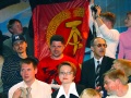 На фоне национального флага ГДР